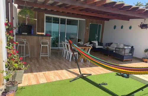 De frente para o mar com a comodidade de acesso as 5 suites climatizadas todas no Terreo - Foto 2