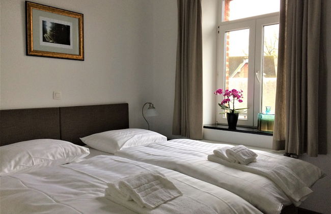 Le Baron Apartments - Photo 9