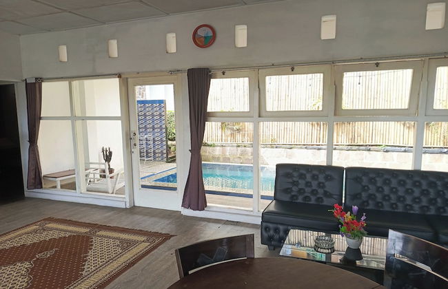 Surga Family House - Foto 18