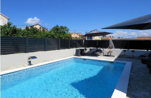 Duplex house Angela with private heated pool - Photo 2