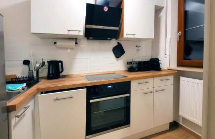 MADISON Homes Apartment 50 qm in Prien mit Balkon, Bergblick, Parkplatz, zentral gelegen - Foto 25