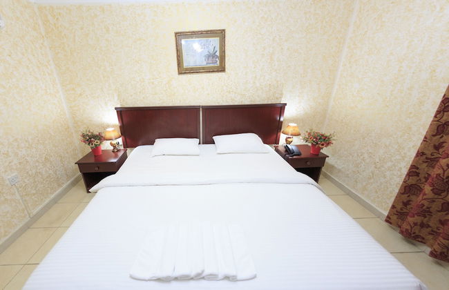 Gulf Hotel Apartment - Photo 11