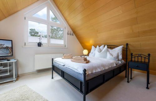 Ferienwohnung - Rügenbrise mit Seeblick mit 3 Bädern, Steg und Paddelboot - alle inklusive - Foto 29