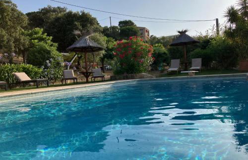 Villa A Scopa à Lumio en Corse avec piscine chauffée, vue mer panoramique, climatisation, jardin arboré de 3000m2, 10 pers, 5 Chb, 4 Sdb - Foto 3
