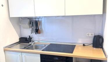 AM Apartment - Photo 4, stove