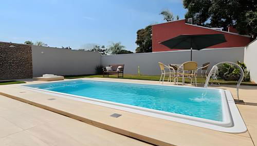 Casa ampla e confortável. Piscina e churrasqueira. - Foto 4