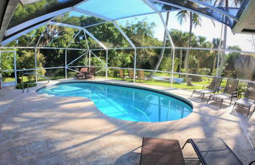 JUPITER WATERFALLS - NEWLY UPDATED - TIKI HUT, FIRE PIT, KITCHEN, POOL HEATER and MORE - Photo 6