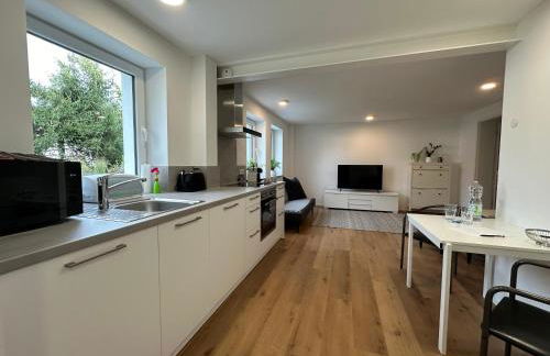 Modernes Apartment mit eigener Terrasse & Garten - Foto 1