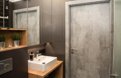 Wola Loft Apartment - Photo 15