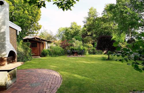 Haus Meereswind Esens, Wintergarten mit Kamin - Foto 31