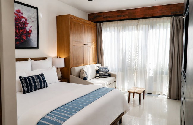 Flamboyan Hotel & Residences - Photo 12