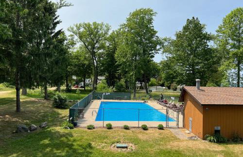 4BR Spacious Condo, Private Lake MI Beach Access, Outdoor Heated Pool - Photo 25