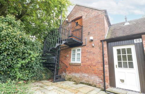 The Coach House Apartment - Foto 18