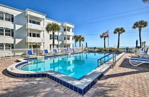 Coastal Condo Escape with Patio Steps to Beach - Photo 1