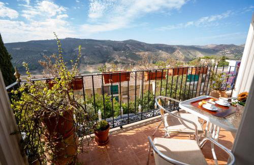 Encanto en Iznájar con terraza y vistas a la montaña - Foto 1