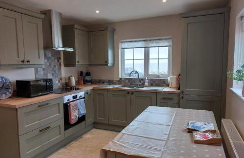 The Beach House Annalong Cosy beachview cottage - Photo 18