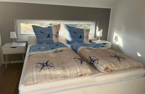 HausLIEBLINGSPLATZ - am Meer - Luxus Villa mit 4 Schlafzimmern, 3 Badezimmern Sauna, Kamin, Weber-Grill und Wallbox - Foto 23