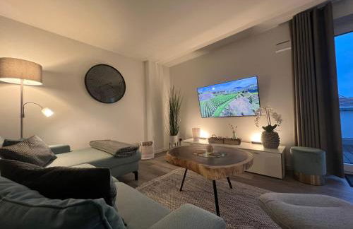 Penthouse Zweite Heimat - mit Sauna, Dachterrasse und ab Mai eigener Wallbox, im Herz von Kellenhusen - Foto 1