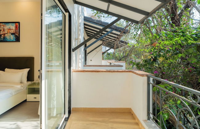 ELIVAAS Laguna Camellia | Luxe 4 BHK Villa Near Popular Beaches with Private Pool - Photo 67