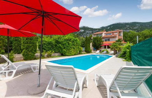 Three-Bedroom Apartment In Ostrvica - Photo 9