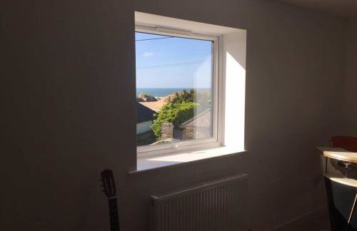 Relax in style at my stunning Holywell Beach home - Foto 9