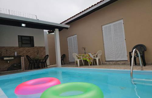 Casa Maravilhosa, Pé na Areia com Piscina, Área Gourmet com Churrasqueira em Deck Coberto Frente a Piscina, Mesa de Bilhar, 4 Quartos Confortáveis, Sendo 2 Suítes, Cozinha Americana e Sala de Jantar, Ampla Garagem para 6 Carros - Mercado na rua da Casa - Photo 10