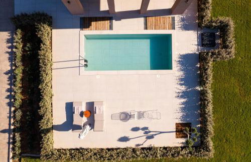 Reveli Suites - Photo 25