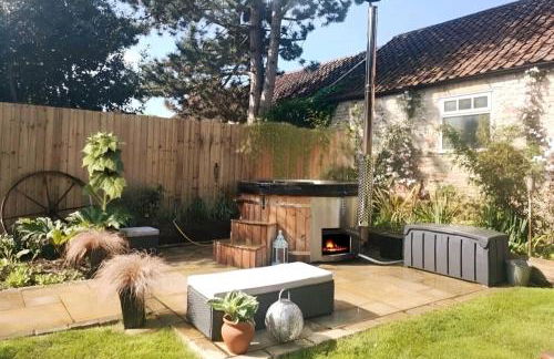 Rural cottage! Wood-fired hot tub Bliss awaits - Photo 4