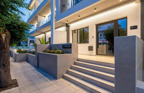 Unicos City Suites - Photo 12