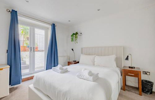 Snug 2BD Flat with Patio Heart of North London - Foto 1