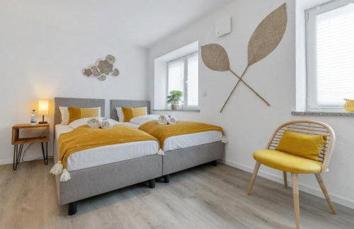 SONNENglück - Großes Apartment für 8 im Zentrum mit flexiblen Betten, Balkon & Parkplatz - Photo 16