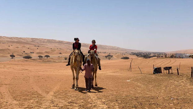 Enjoy a camel ride through the desert