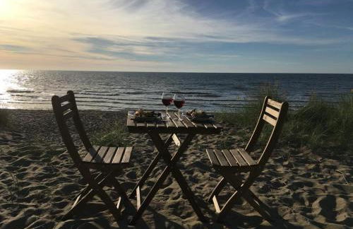 Maison les pieds dans le sable - Photo 1
