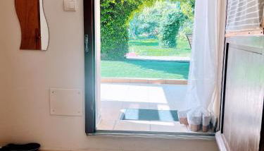 chambre et salle de bain privé s'ouvrant sur terrasse, jardin et cuisine d'été - Foto 3, Garden view