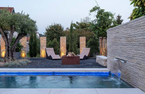 Domizil Relax - Heimathafen mit ruhiger Terrasse, Blick auf Wasserbecken und Garten - Photo 16