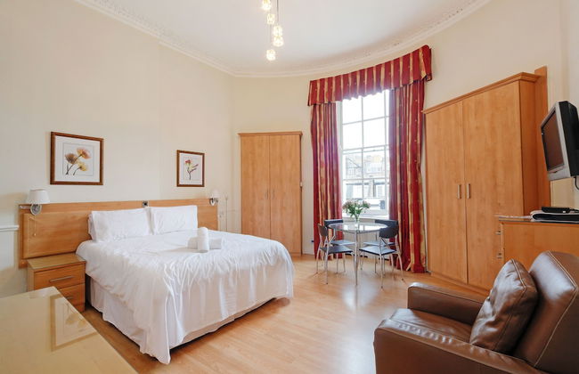 Baker Street Suites - Photo 43