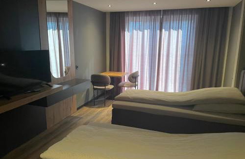 A & B Apartment und -Zimmervermietung - Foto 7