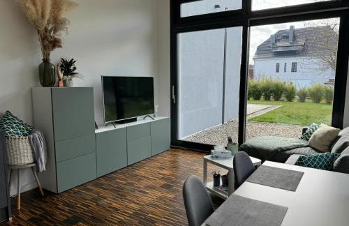 helle Ferienwohnung in Architektenhaus mit Garten und Pool - Foto 7