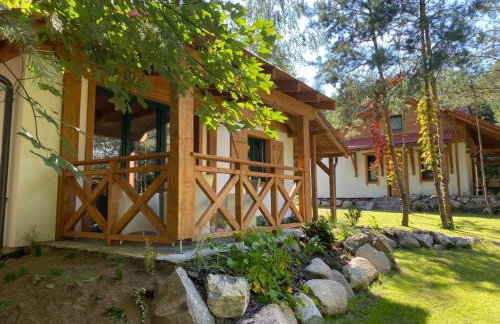 Leśna Kryjówka domki w lesie - Foto 49