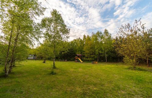 Sosnowy Raj domki nad rzeką Wkrą - Foto 57