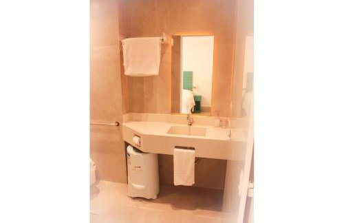 Casa d'Aroeira Residencial Boutique - Centro de Juqueí - Perto de Tudo - 2 quadras do Mar - Serviço de Praia - Roupa de Cama 600 fios algodão Egípcio - Tudo Novo - Estacionamento Interno - Cozinha - Consulte unidades com Ofurô Hidro e Cromoterapia - Foto 72