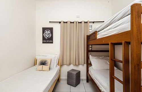 Casa para Famílias e Grupos com Ar-condicionado e Churrasqueira em Praia Grande - Foto 6