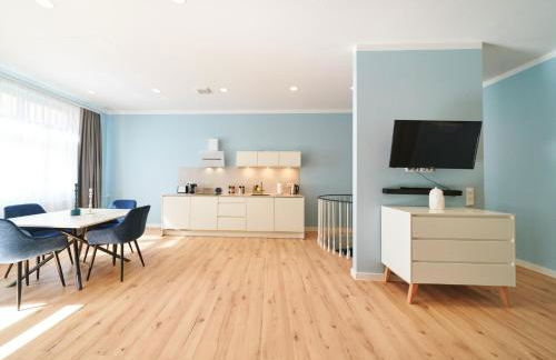 Design Apartment mit kostenfreiem Garagen Parkplatz im Zentrum - Foto 3