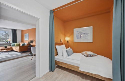 MAISUITES Sperling - Zentrale Ferienwohnung mit Boxspringbett, Kaffeevollautomat, WLAN & seitlichem Seeblick - Foto 16