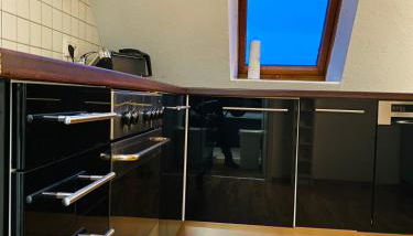 Charmante Ferienwohnung mit Kaminofen - Foto 3