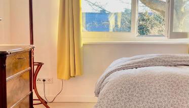 Gemütliche Wohnung mit Sonnenterrasse im blauen Holzhaus - Foto 5, Garden view