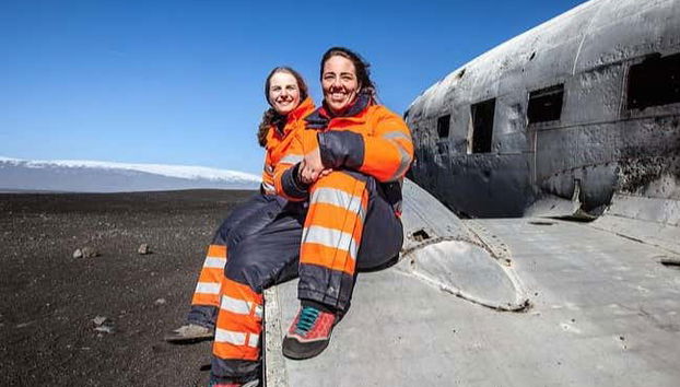 Taking a break next to a plane wreck