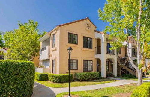 Poolside 2BR Condo with Balcony & Workspace - Photo 39
