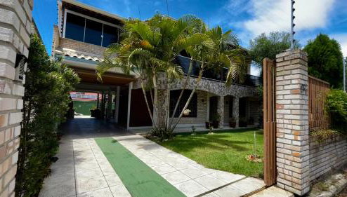 Casa espaçosa com sala de jogos interna e externa - Foto 1, Garden view