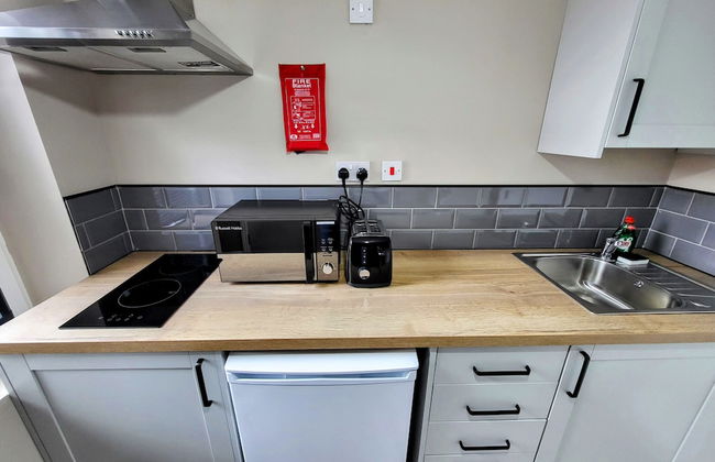 Comfortable Stay - LB Ave - Photo 21